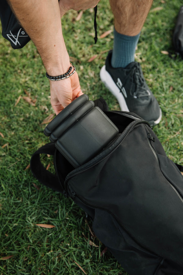 Traditional foam roller taking up entire gym bag